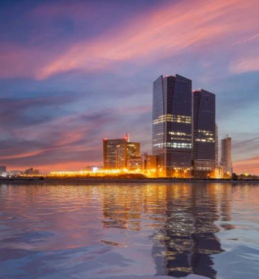 Karachi, Pakistan - January 11, 2021: Cityscape, landmarks of Karachi, Bahria Tower, Dolmen mall Clifton, golden hour. sunset at Karachi, sea view