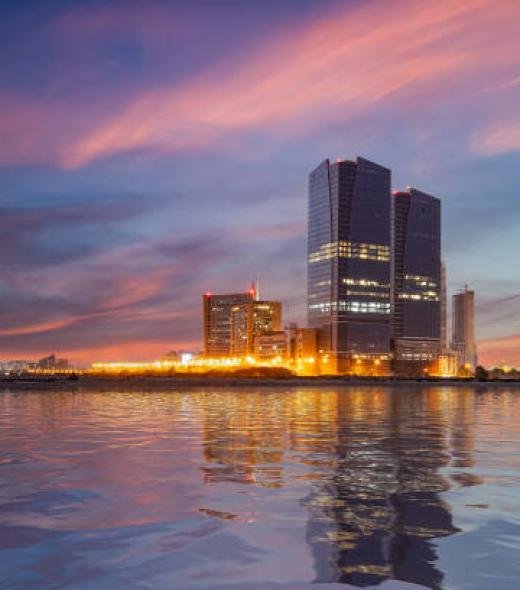 Karachi, Pakistan - January 11, 2021: Cityscape, landmarks of Karachi, Bahria Tower, Dolmen mall Clifton, golden hour. sunset at Karachi, sea view